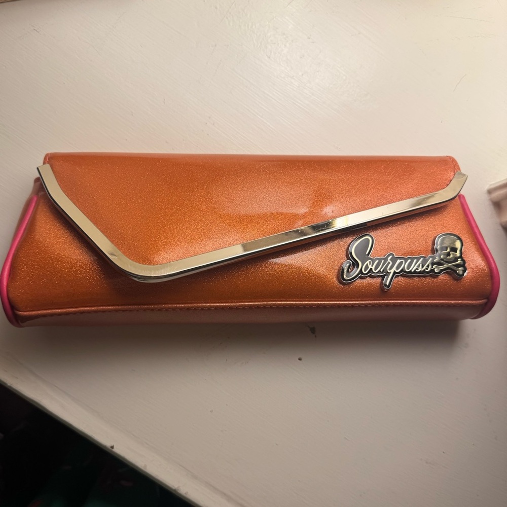 NWOT SOURPUSS slim party clutch with chrome trim